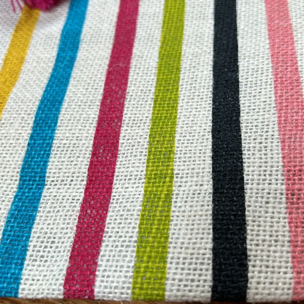 Mud Pie new with tag striped jute bag. Green, pink, black gold. Pompom tassles.